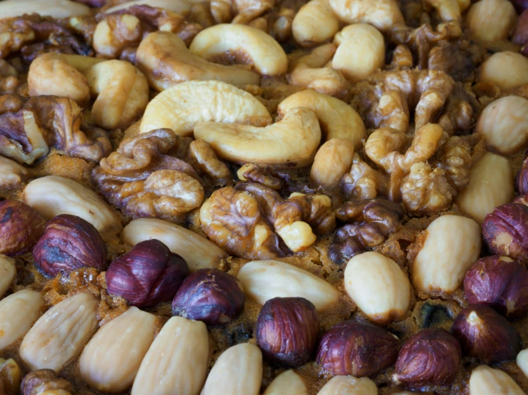 a bunch of nuts and nuts all grouped together