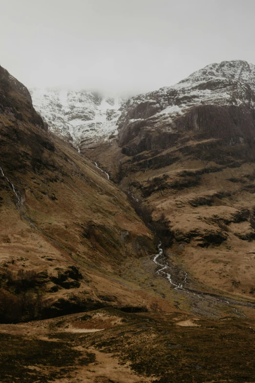 landscape with mountain and stream in background