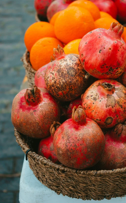 various fruit in baskets on display outdoors