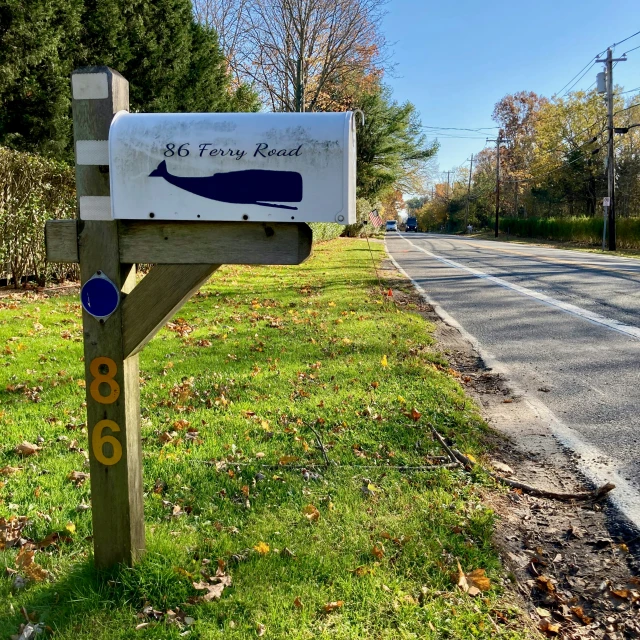 there is an information sign next to the road