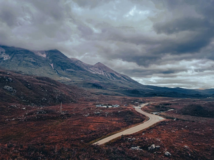 the road is in a straight line across a barren terrain