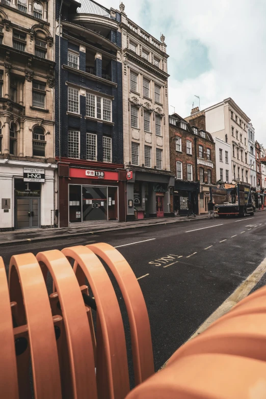 the empty street in front of old buildings