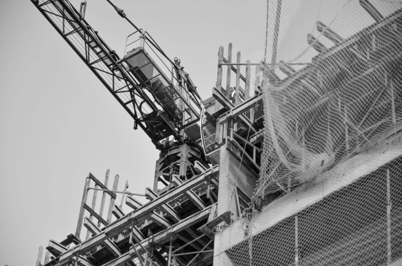 several large metal structures against the sky