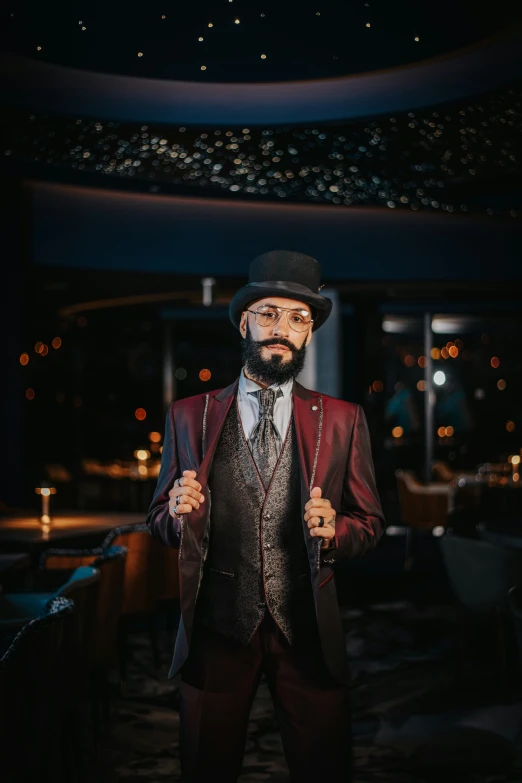 a person wearing a suit and tie with a beard