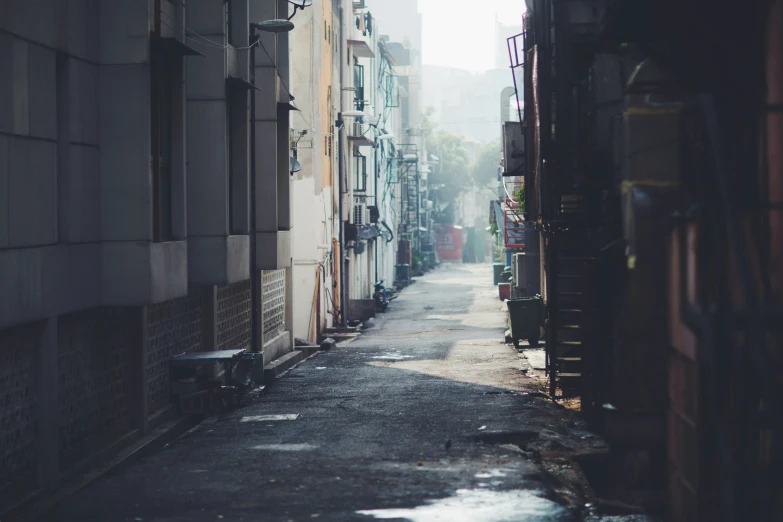 an old fashioned looking city street with no cars or people