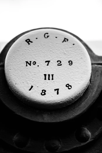 black and white po of the dial on a typewriter