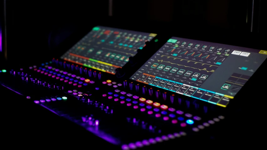 a black illuminated display of a multi - color keyboard
