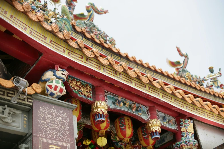 a closeup of a building with hanging decorations