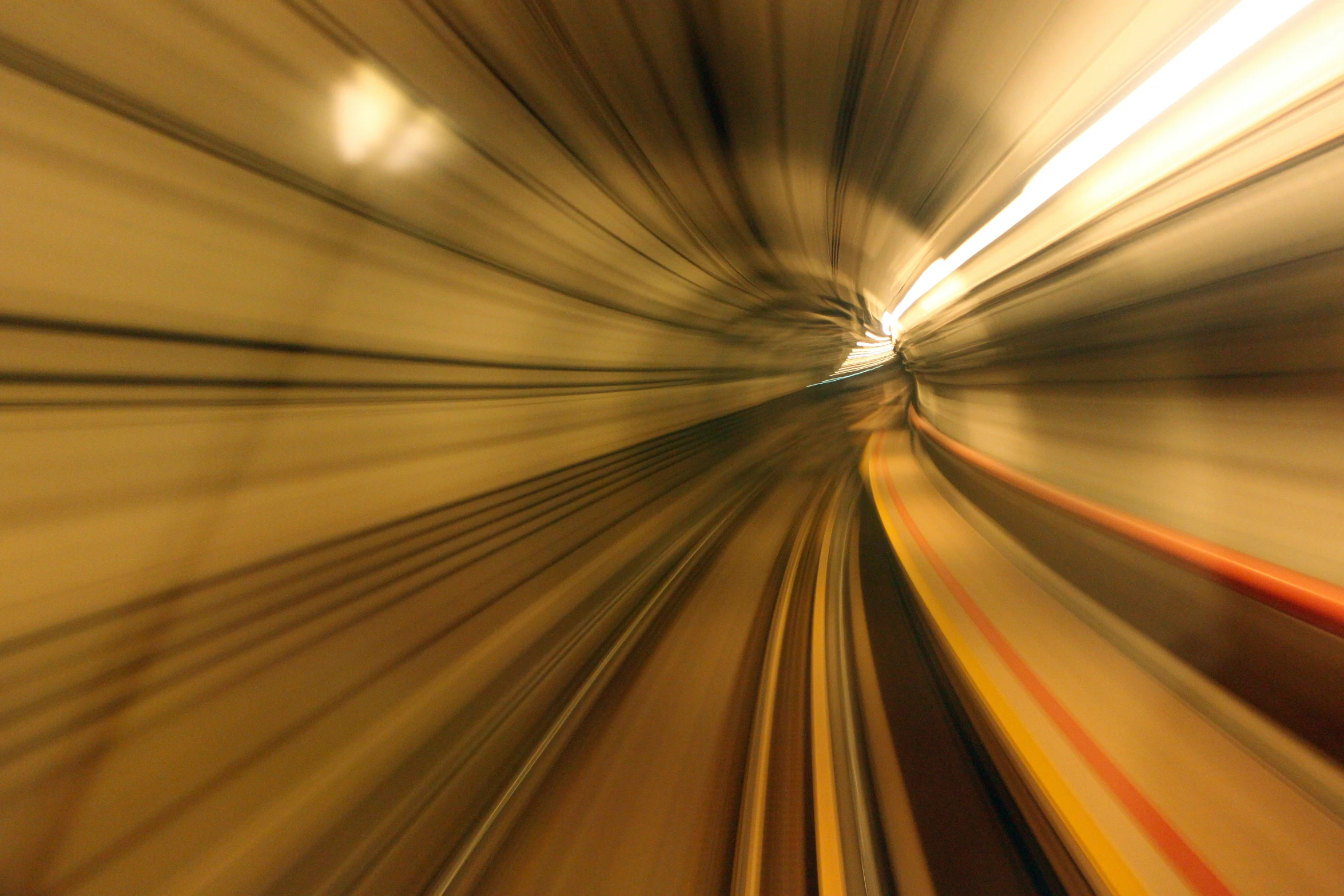 the motion of a train passing by through a tunnel