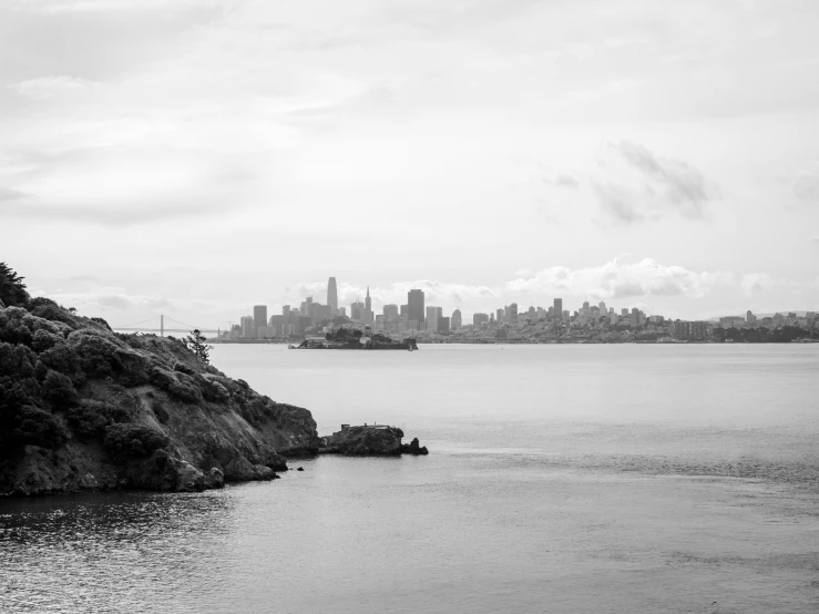 a large body of water surrounded by tall buildings