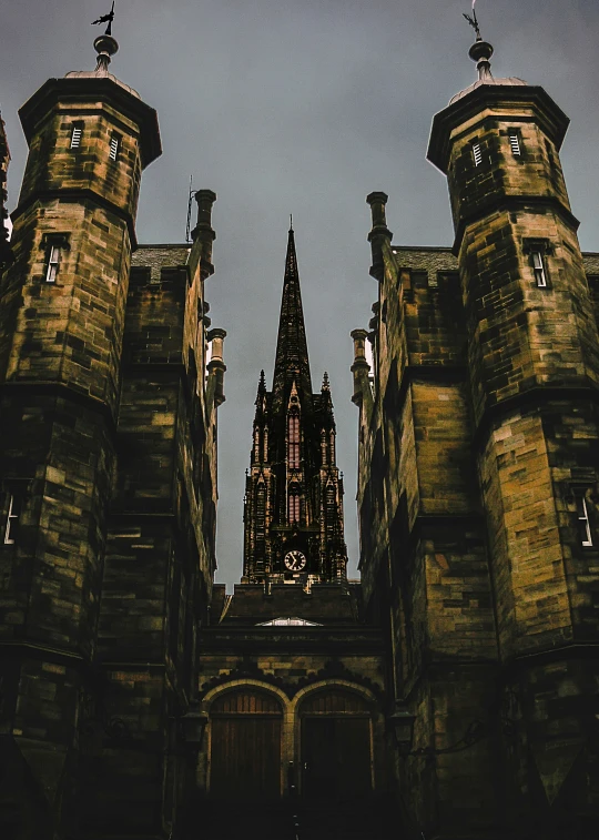 a gothic architecture with two steeples and tall spires