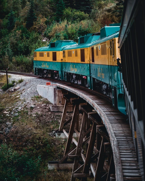 the train is crossing an old bridge