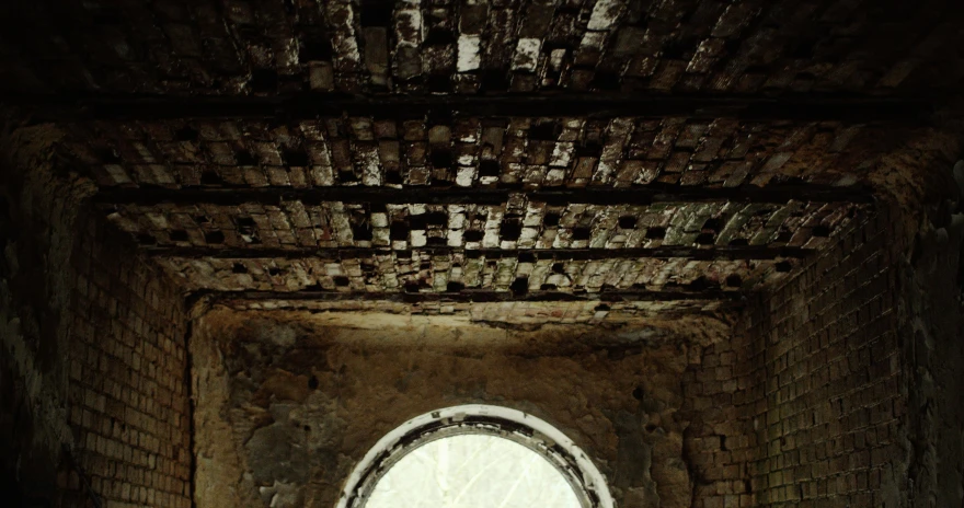 the light is shining on a window inside the building