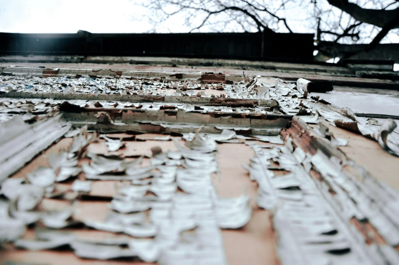 the old building has peeling paint on it