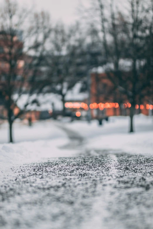 a street covered in a layer of snow