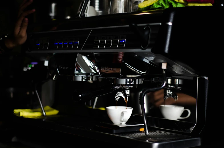 a machine with coffee coming out of it with bananas