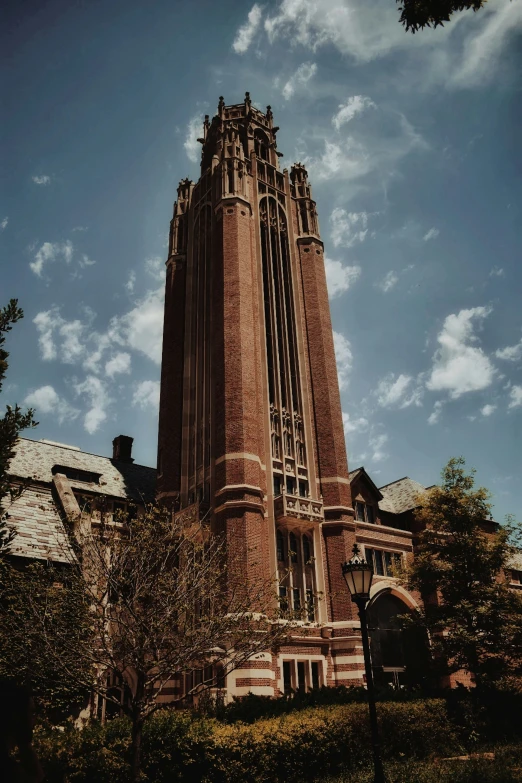 the huge building has clock tower and windows