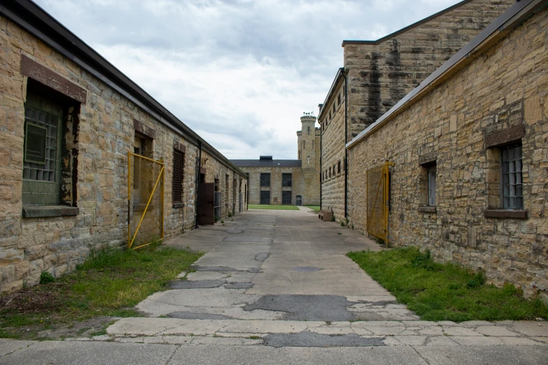 the street is lined with small brick buildings