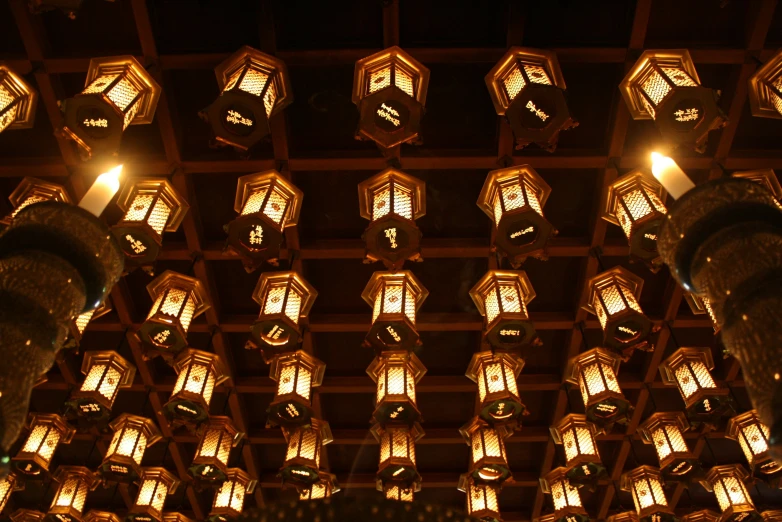 many lamps attached to the ceiling at a resort