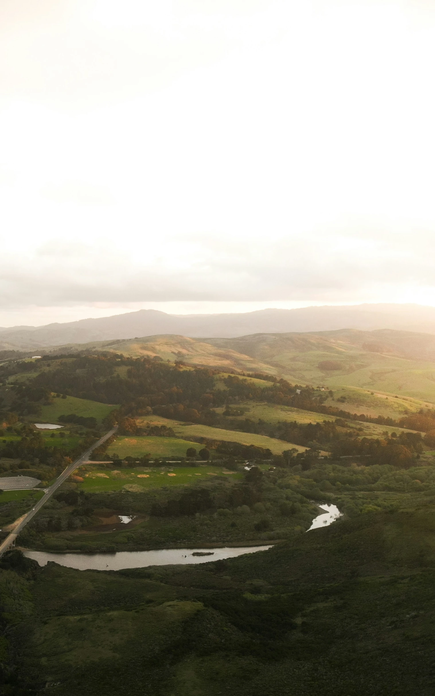 an aerial po of a hilly countryside