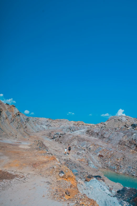 a large hill with some very big rocks on top