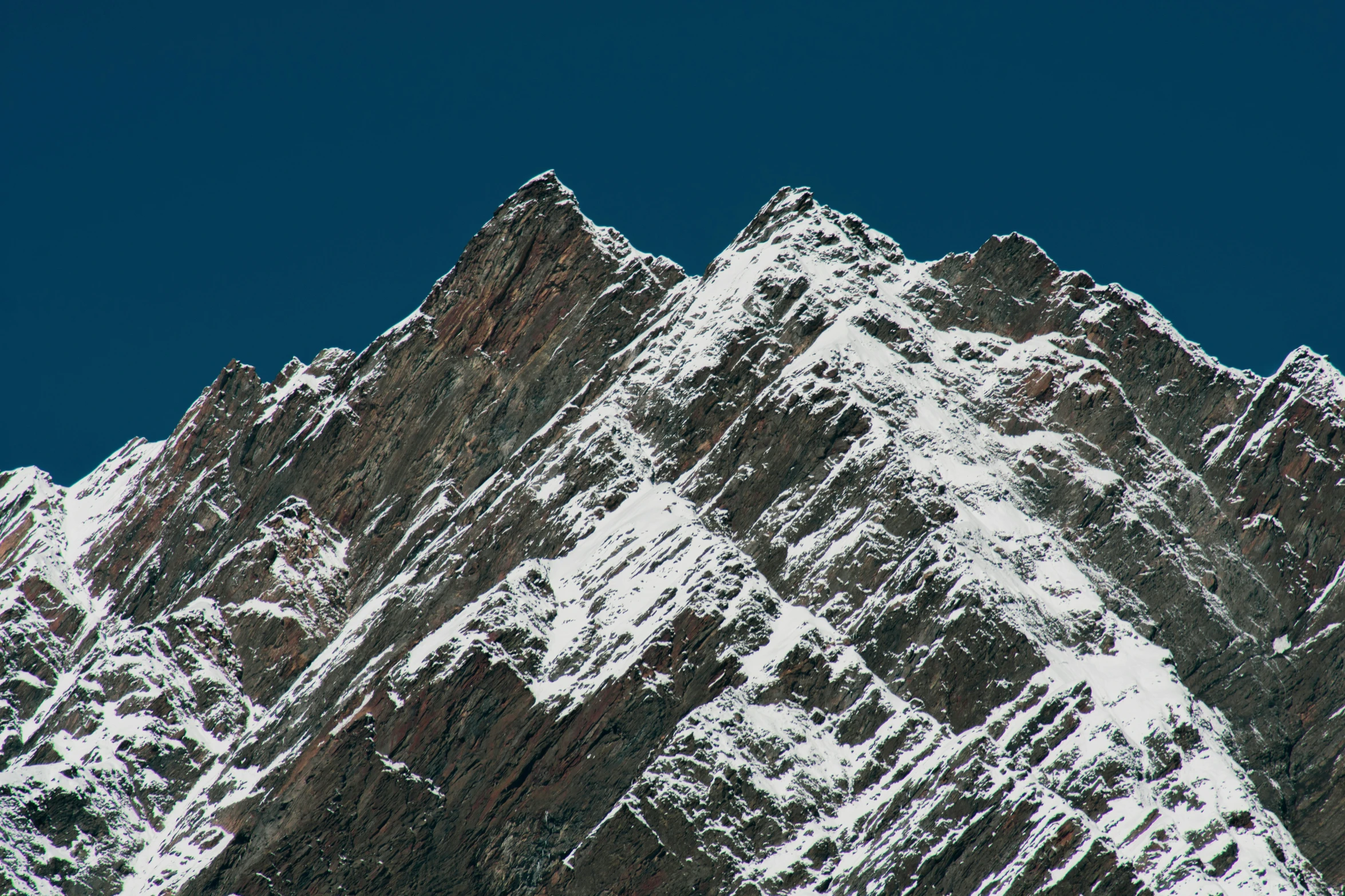 the mountains are covered in snow during winter