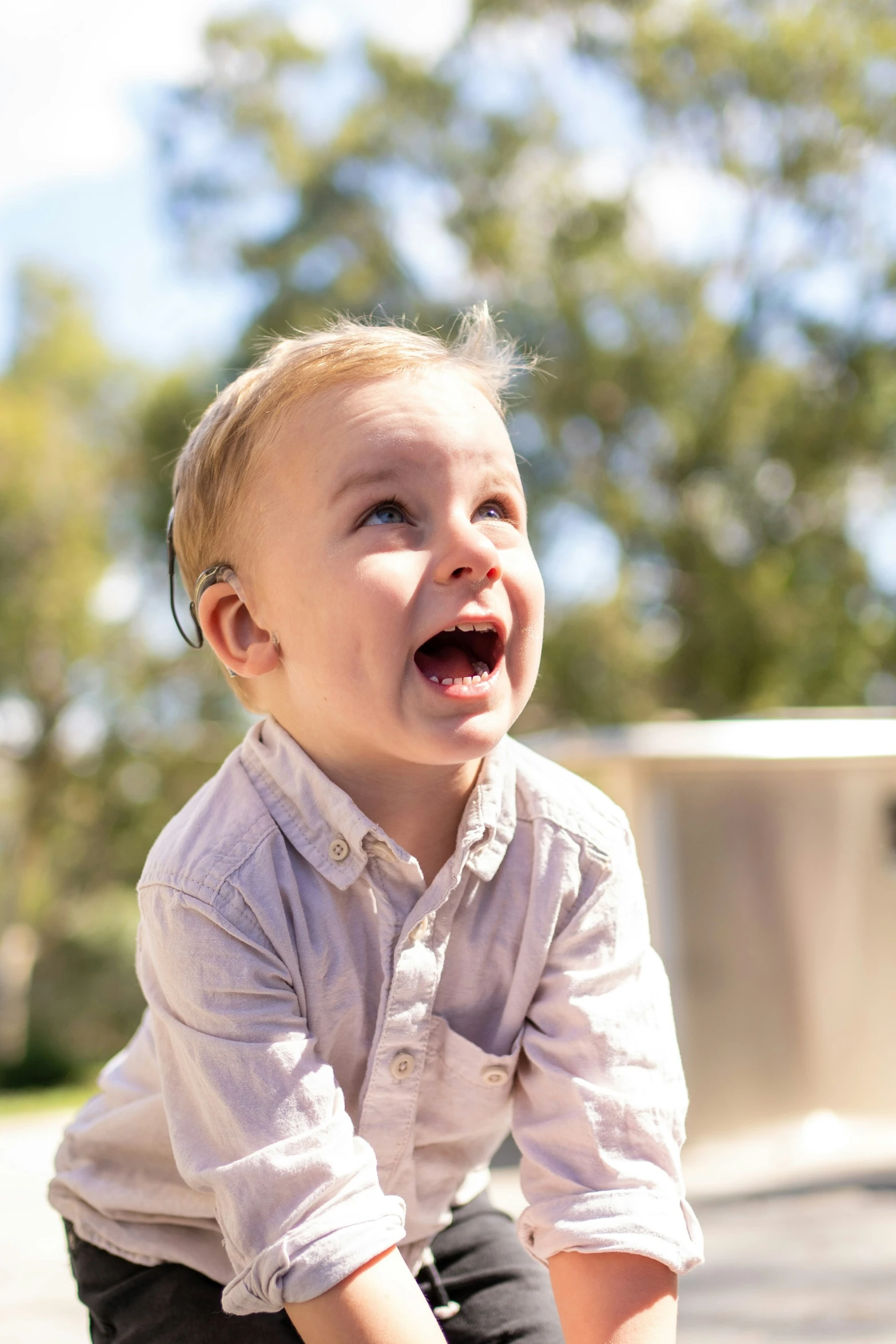 a little boy who has a grin on his face