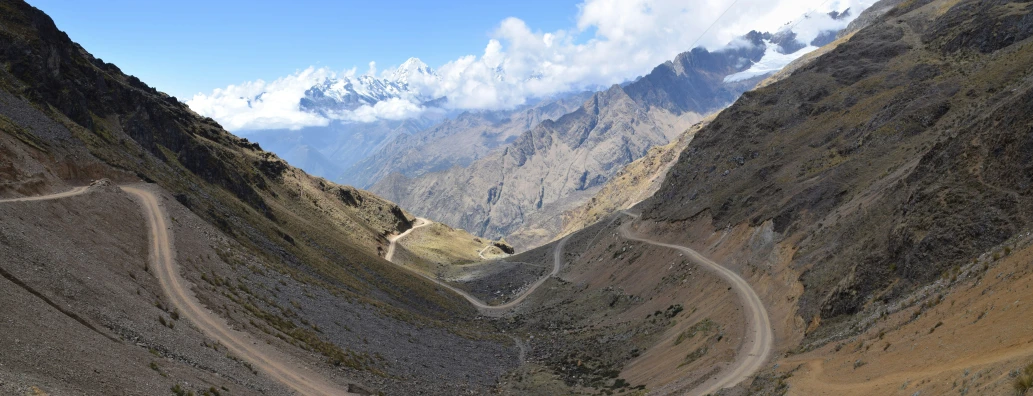 the mountain pass is curving and winding in the mountains