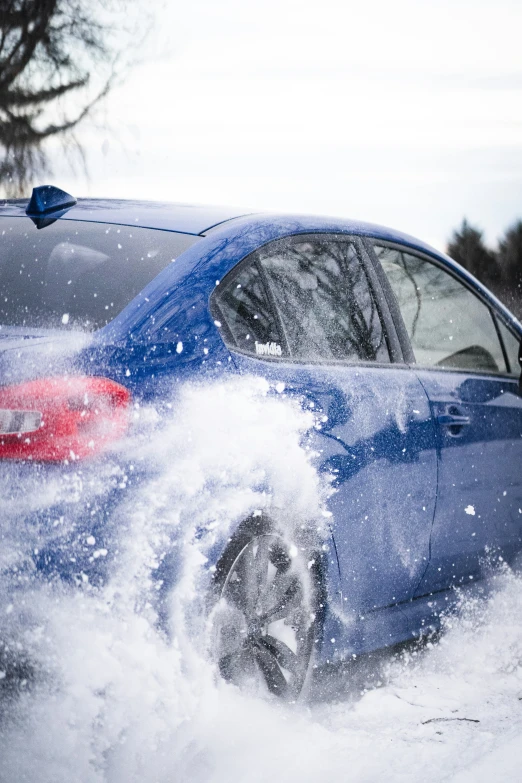 a car is completely covered with snow