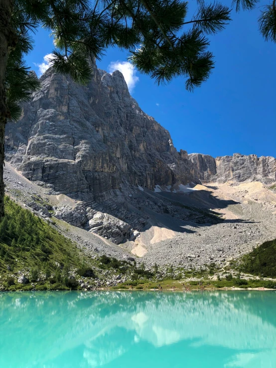 the view of a mountain and a lake from below