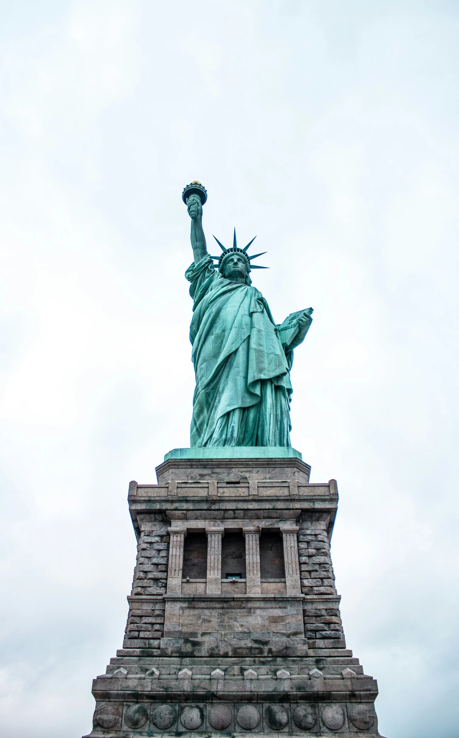 the statue of liberty on top of a tower