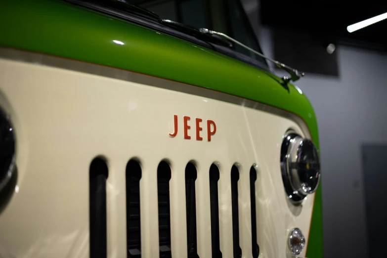 an jeep that is painted with a green and white stripe