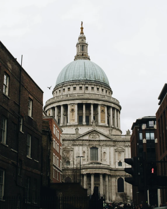 a white dome on top of a building in the city