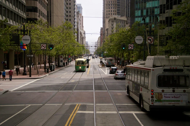 there are trolleys and a tram on this street