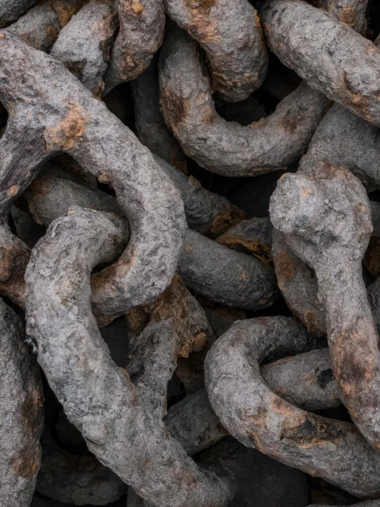 an image of a large pile of old chains