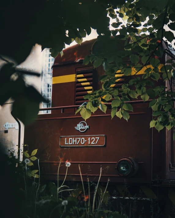 a train car is sitting in the field