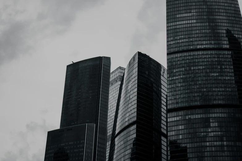 a couple of buildings that are sitting in the sky