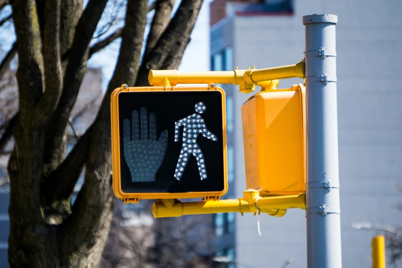 a street sign with the words walk right and a crossing signal