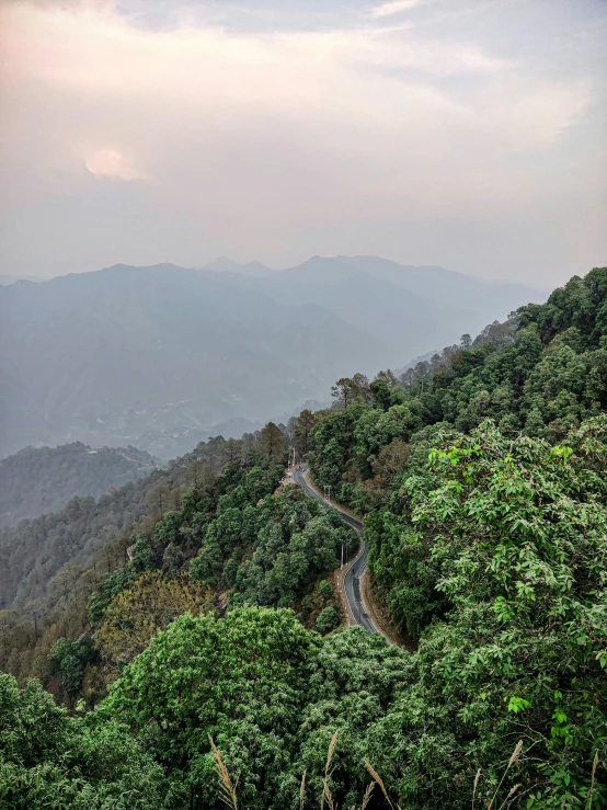 a road is shown going up the side of a mountain