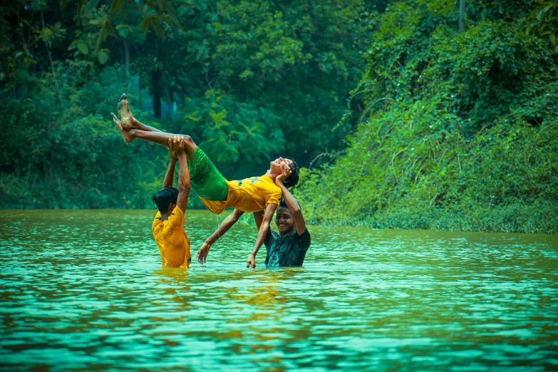 two people on one knee in the water