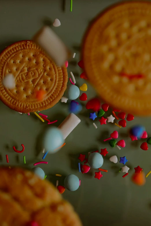 cookies and confetti are falling into the plate