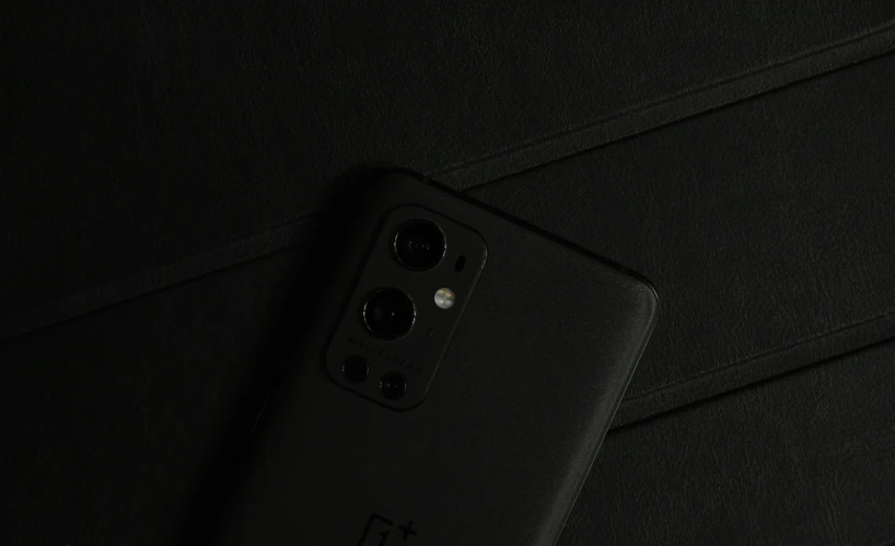 the back of a phone in black, with ons