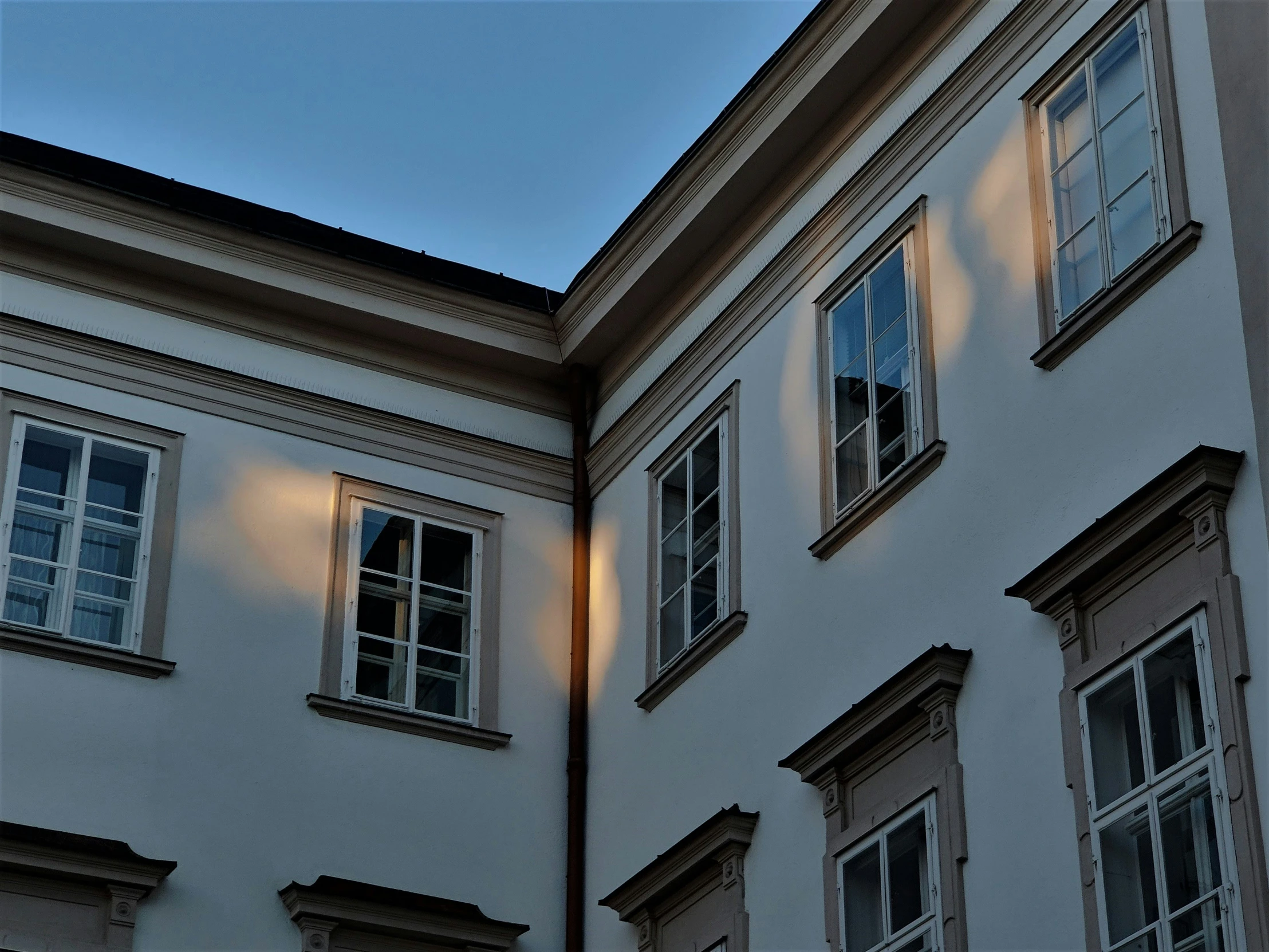 a clock that is sitting in the middle of a building