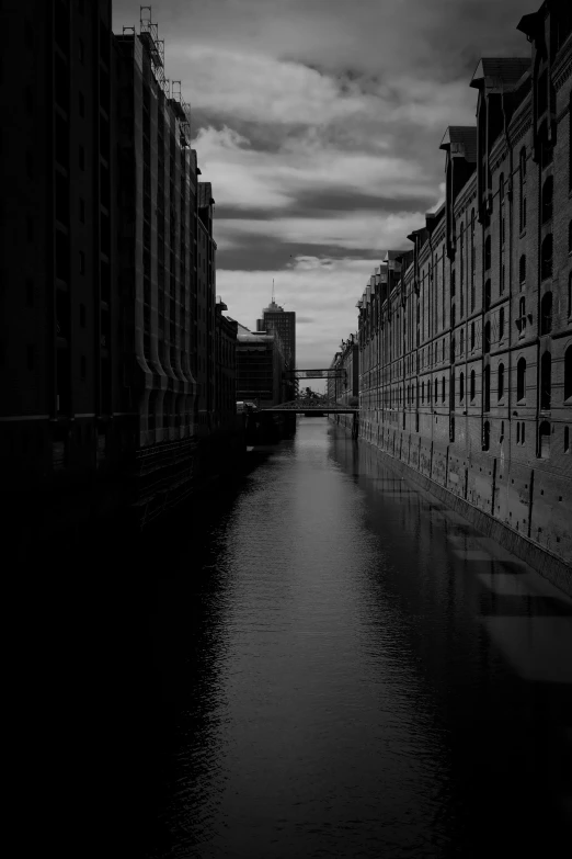 an image of a river that is lined with buildings