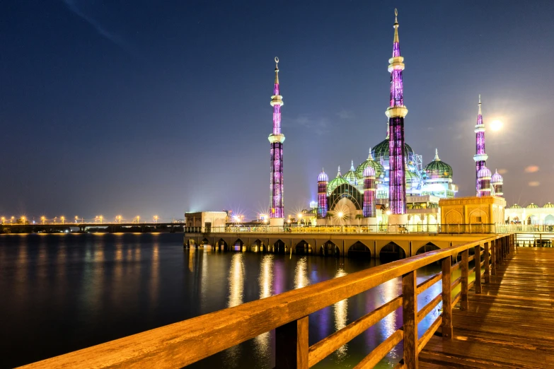 a view of the boardwalk in front of a city