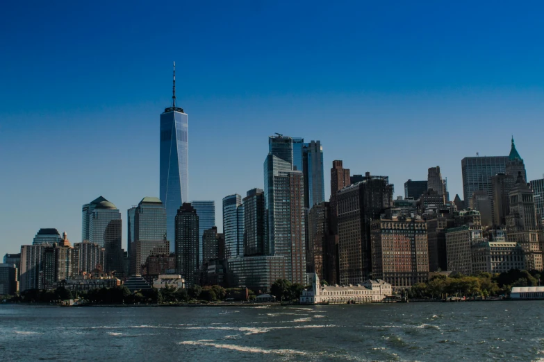 the view of the lower skyline of nyc from the water