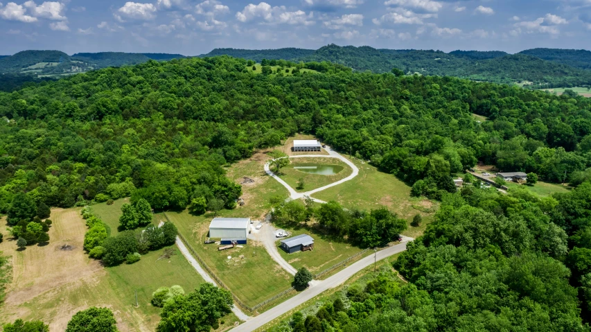 an aerial view of the property with its surrounding mountains