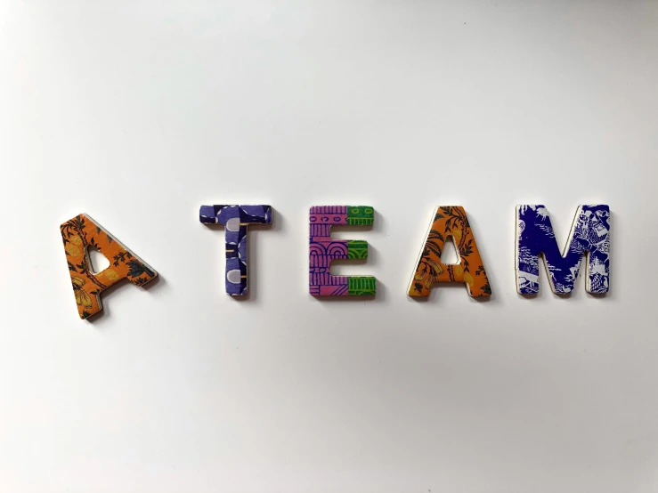 several blocks spelling out words as a team
