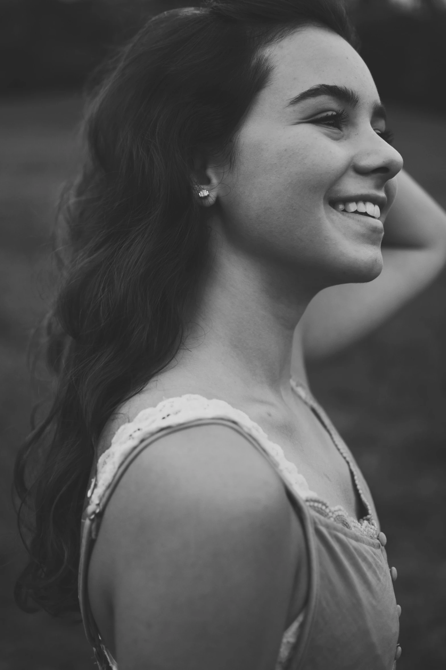 a woman is smiling while posing for the camera