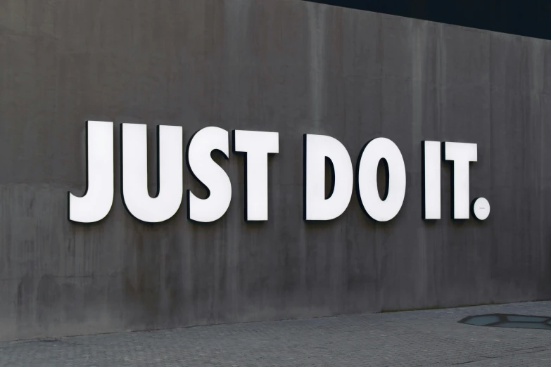 the words just do it in the large letters on the wall